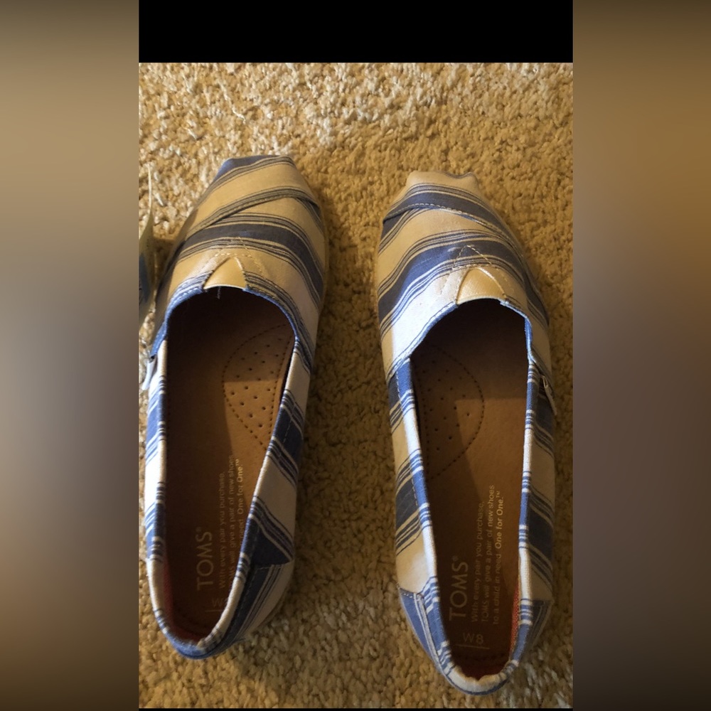 Toms Navy Umbrella strip shoe. New with tags